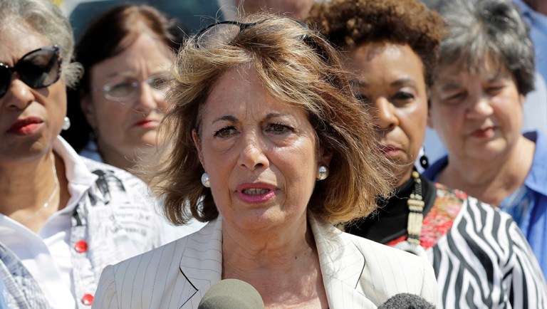 Rep. Jackie Speier, D-Calif., center, is joined by other members of Congress.