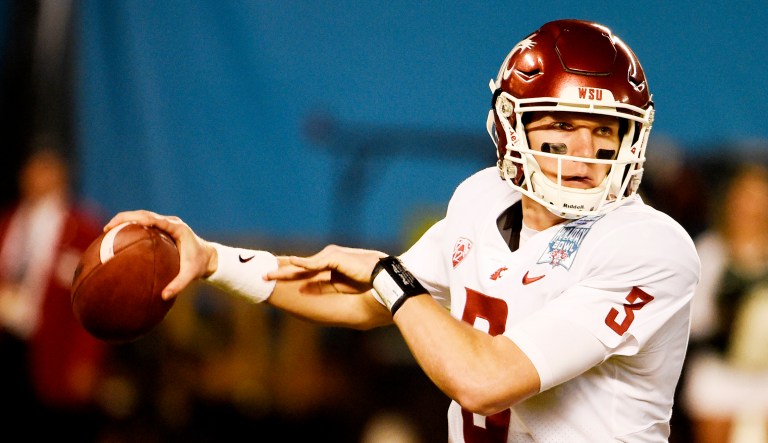 In this 2017 photo, Washington State quarterback Tyler Hilinski, throws during the first half of the Holiday Bowl NCAA college football game against Michigan State in San Diego. The family of Hilinski who died of suicide in January said the 21-year-old quarterback had extensive brain damage that's been linked to concussions from playing the sport. Hilinski was found dead in his apartment with a gunshot wound and a suicide note on Jan. 16, 2018.
