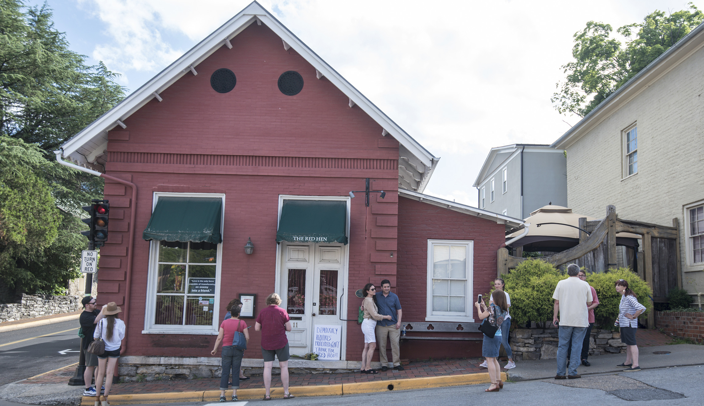Restaurant that kicked out Sarah Sanders reopens to protests