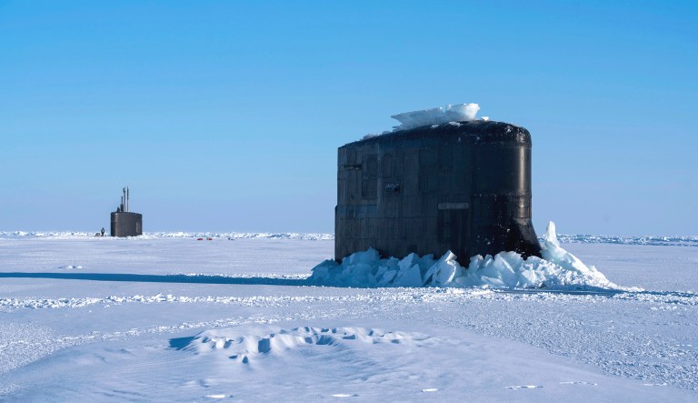 In this photo provided by the U.S. Navy, the Seawolf-class fast-attack submarine USS Connecticut and the Los Angeles-class fast-attack submarine USS Hartford break through the ice in the Beaufort Sea in support of Ice Exercise 2018, a five-week exercise that allows the Navy to assess its operational readiness in the Arctic.