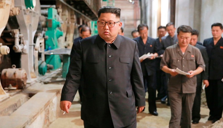 In this undated photo provided on July 2, 2018, by the North Korean government, North Korean leader Kim Jong Un, center, visits Sinuiju Chemical Fibre Mill in Sinuiju, North Korea. Independent journalists were not given access to cover the event depicted in this image distributed by the North Korean government.  The content of this image is as provided and cannot be independently verified. Korean language watermark on image as provided by source reads: "KCNA" which is the abbreviation for Korean Central News Agency.