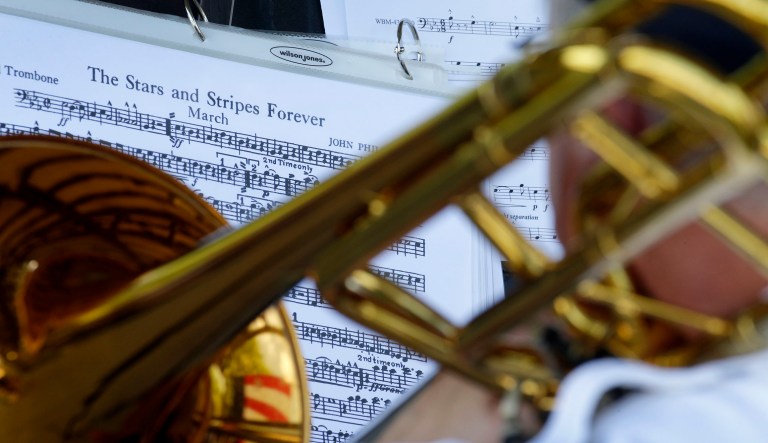 A musician plays "The Stars and Stripes Forever" during an Independence Day concert in Merriam, Kan.
