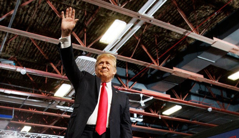 President Trump arrives to speak at a rally at the Four Seasons Arena at Montana ExpoPark on Thursday in Great Falls, Mont.