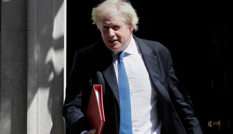 FILE- In this file photo dated Wednesday, June 13, 2018, Britain's Foreign Minister Boris Johnson leaves 10 Downing Street in London.  UK Foreign Secretary Boris Johnson has resigned Monday July 9, 2018, amid Cabinet splits over Brexit.