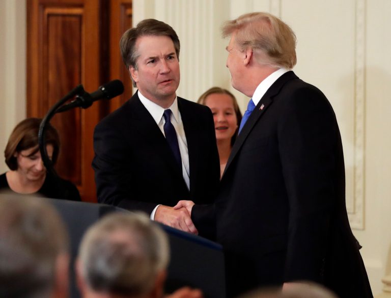 President Donald Trump shakes hands with Judge Brett Kavanaugh his Supreme Court nominee, in the East Room of the White House, Monday, July 9, 2018, in Washington.