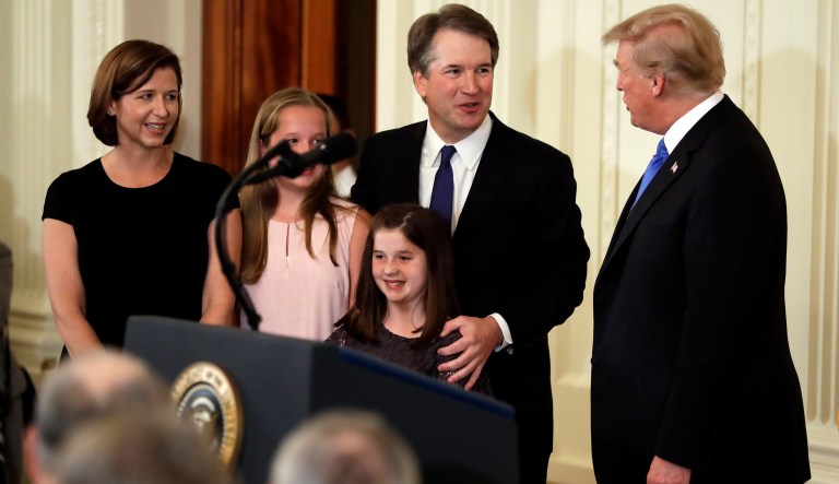 President Donald Trump stands with Judge Brett Kavanaugh his Supreme Court nominee, in the East Room of the White House, Monday, July 9, 2018, in Washington.