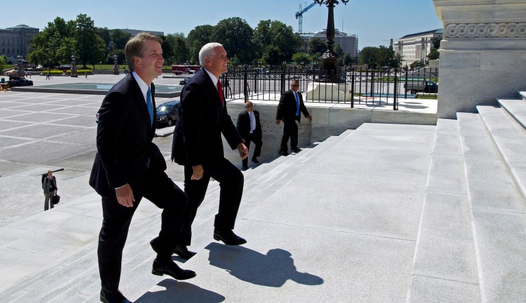 Vice President Mike Pence, right, accompanied by Supreme Court nominee Judge Brett Kavanaugh, arrives at the U.S. Capitol in Washington on Tuesday.