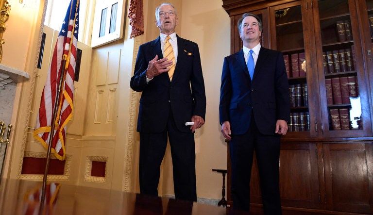 Supreme Court nominee Brett Kavanaugh, right, listens as Sen. Chuck Grassley, R-Iowa, left, speaks on Capitol Hill in Washington, Tuesday, July 10, 2018. Kavanaugh is on Capitol Hill to meet with Republican leaders as the battle begins over his nomination to the Supreme Court.
