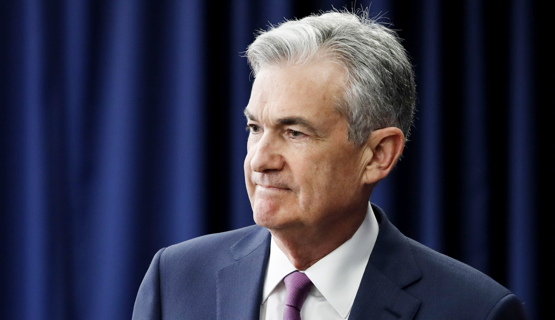 Fed holds rates steady amid Trump pressure to ease money, calls economic growth ‘solid’