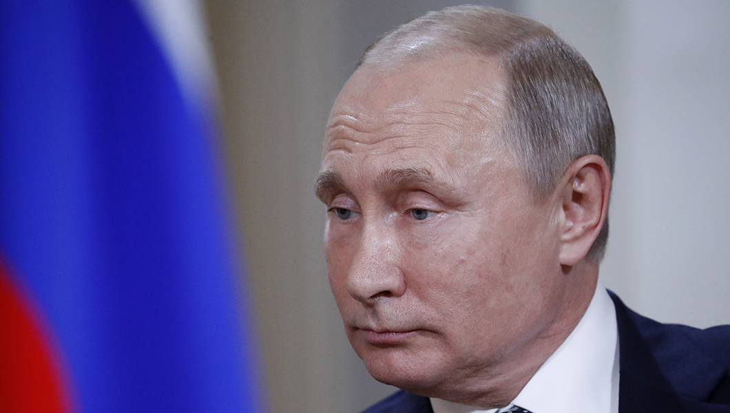 Putin laughs off election interference question