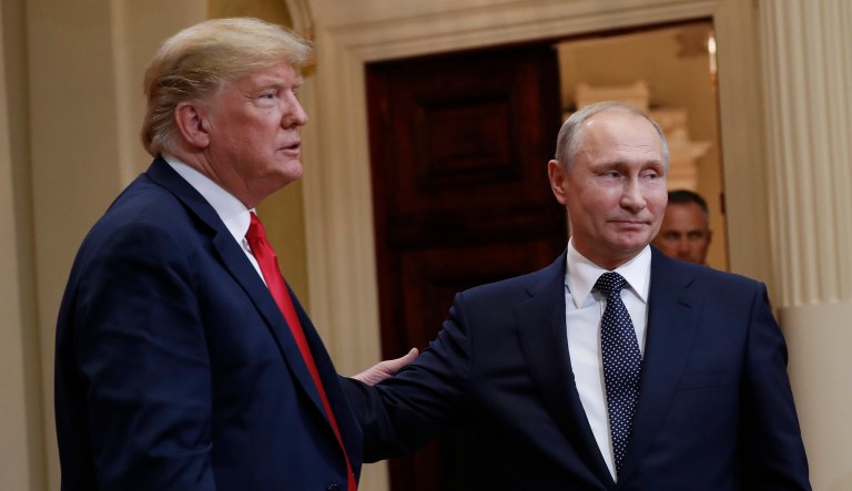 President Trump and Russian President Vladimir Putin leave the stage together at the conclusion of their joint news conference at the Presidential Palace in Helsinki, Finland, Monday, July 16, 2018.