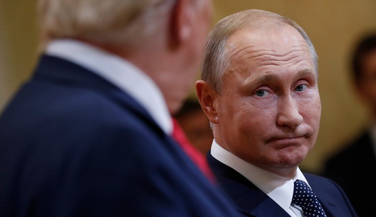 President Trump turns to Russian President Vladimir Putin during a joint news conference at the Presidential Palace in Helsinki, Finland, on July 16, 2018.