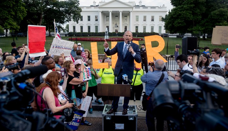 Michael Avenatti, attorney for porn actress Stormy Daniels, speaks at a protest outside the White House, Tuesday, July 17, 2018, in Washington. This is the second day in a row the group has held a protest following President Donald Trump's meetings with Russian President Vladimir Putin.