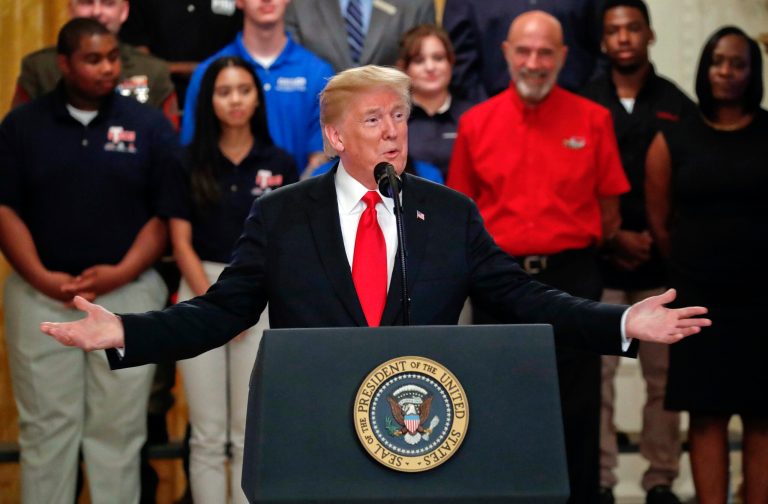 President Donald Trump gestures while speaking before signing an Executive Order that establishes a National Council for the American Worker, during a ceremony in the East Room of the White House in Washington, Thursday, July 19, 2018. 