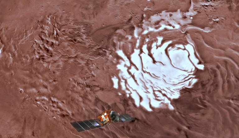 This image shows an artist's rendering of the Mars Express spacecraft (pictured below center) probing the southern hemisphere of Mars.