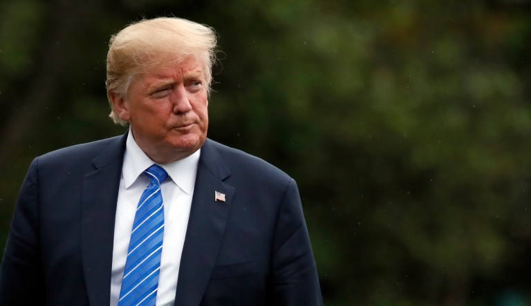 President Trump walks on the South Lawn after stepping off Marine One at the White House on July 24, 2018, in Washington.