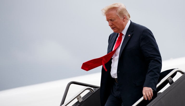 President Trump walks down the steps of Air Force One after arriving at St. Louis Lambert International Airport on July 26, 2018, in St. Louis, Mo.