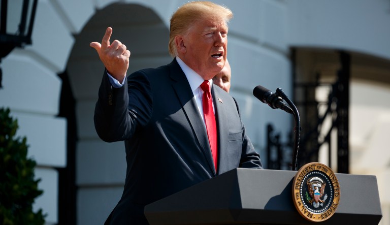 President Donald Trump delivers remarks about the economy on the South Lawn of the White House, Friday, July 27, 2018, in Washington.