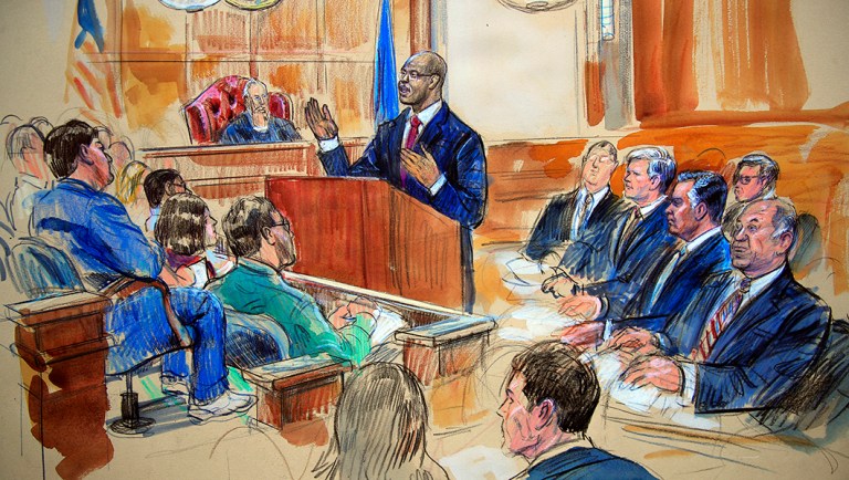 This courtroom sketch depicts Paul Manafort, seated right row second from right, together with his lawyers, the jury, seated left, and the U.S. District Court Judge T.S. Ellis III, back center, listening to Assistant U.S. Attorney Uzo Asonye.