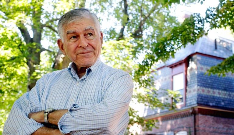Former Massachusetts governor and onetime Democratic presidential candidate Michael Dukakis stands for a photograph at his home in Brookline, Mass.
