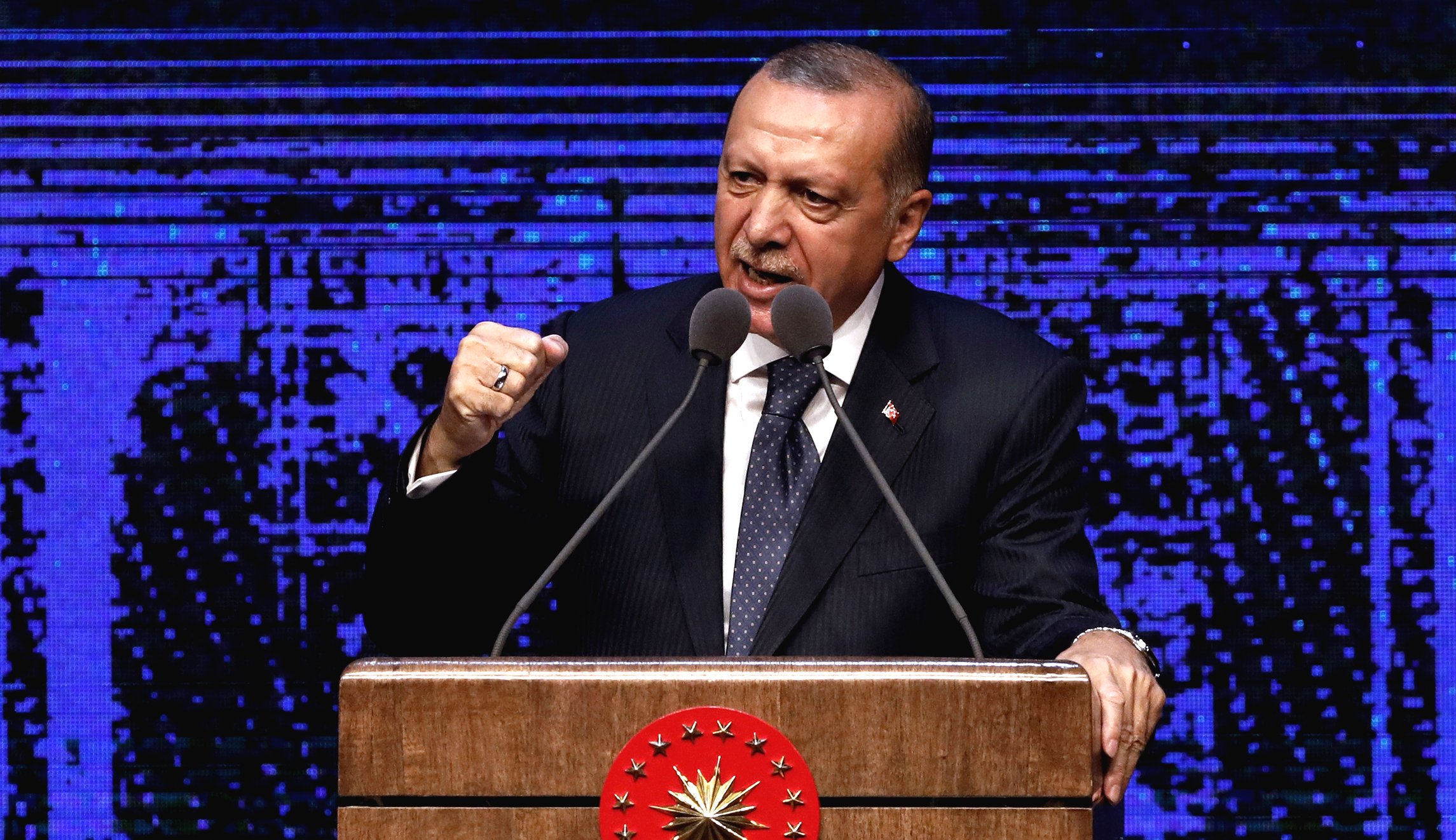 Erdogan threatens sanctions for two Cabinet members