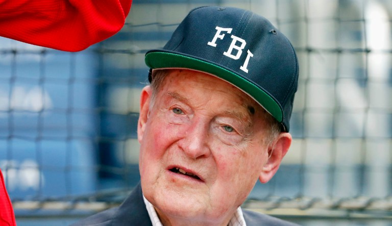 Judge William Webster, former FBI and CIA director, stands during the national anthem in Washington, D.C.