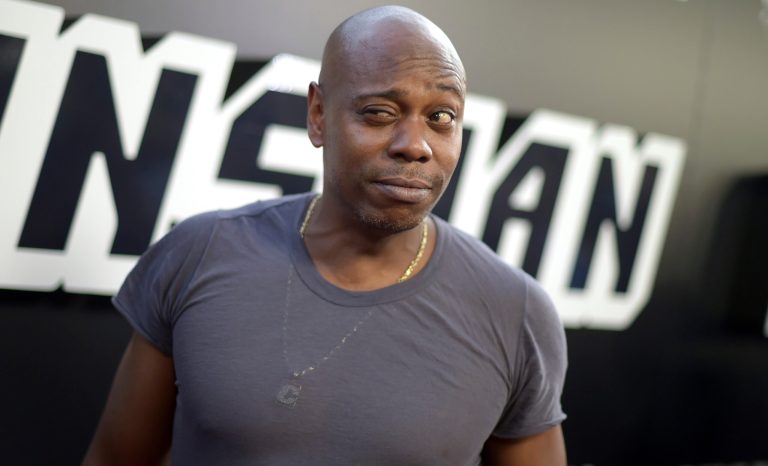 Dave Chappelle arrives at the premiere of "BlacKkKlansman" on Wednesday, Aug. 8, 2018, at the Samuel Goldwyn Theater in Beverly Hills, Calif. 