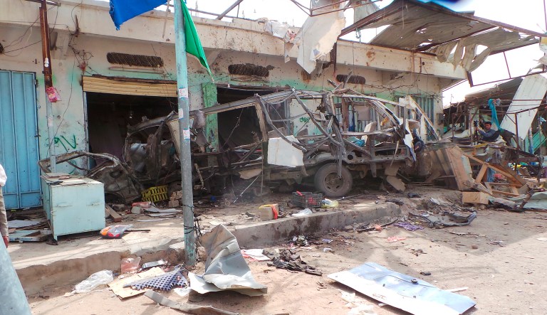 The wreckage of a bus remains at the site of an airstrike in Saada, Yemen on Friday, Aug. 10, 2018. Yemen's Shiite rebels are backing a United Nations' call for an investigation into a Saudi-led coalition airstrike in the country's north that killed dozens of people the previous day, including many children.