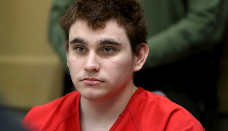 Florida school shooting suspect Nikolas Cruz listens during a status check on his case at the Broward County Courthouse in Fort Lauderdale, Fla., on Wednesday, Aug. 15, 2018.     Cruz faces the death penalty if convicted in the shooting that killed 17 people in Parkland  at Marjory Stoneman Douglas High School, where classes resumed Wednesday.