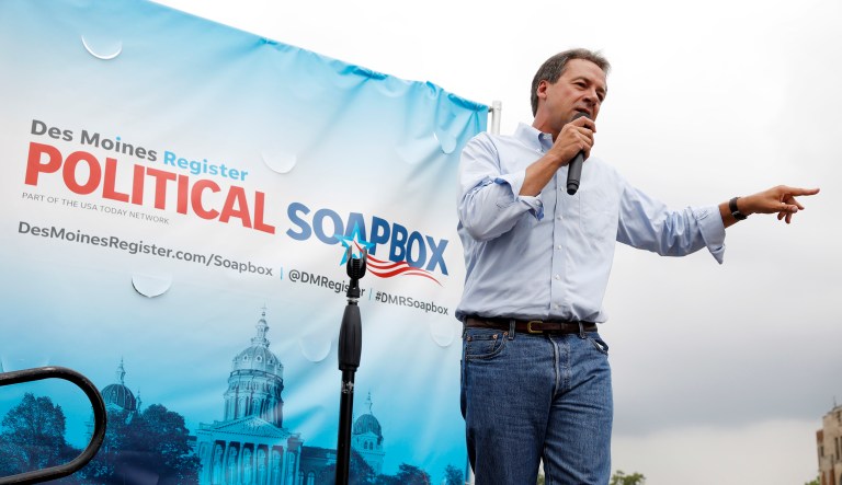 Montana Gov. Steve Bullock speaks at the Des Moines Register Soapbox during a visit to the Iowa State Fair, Thursday, Aug. 16, 2018, in Des Moines, Iowa.