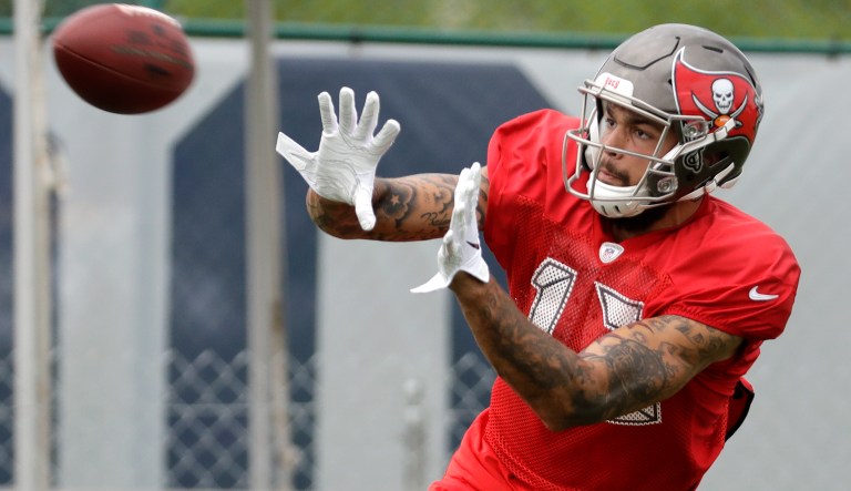 Tampa Bay Buccaneers wide receiver Mike Evans catches a pass during NFL football training camp Thursday, Aug. 16, 2018, in Nashville, Tenn.