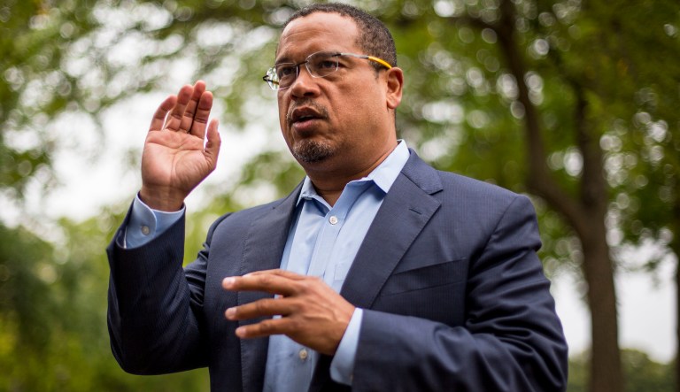 Rep. Keith Ellison addresses his campaign volunteers and supporters before sending them off on a door knocking campaign, Friday, Aug. 17, 2017 in Minneapolis. Minnesota Rep. Keith Ellison said Friday he won't abandon his campaign for attorney general amid allegations that he once physically abused an ex-girlfriend and said if she claims to have a video of the incident she should produce it.