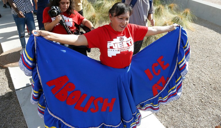Immigration activists march in protest against the Maricopa County Sheriff and Immigration and Customs Enforcement at the county jail in an ongoing effort to get immigration authorities out Wednesday, Aug. 22, 2018, in Phoenix. 
