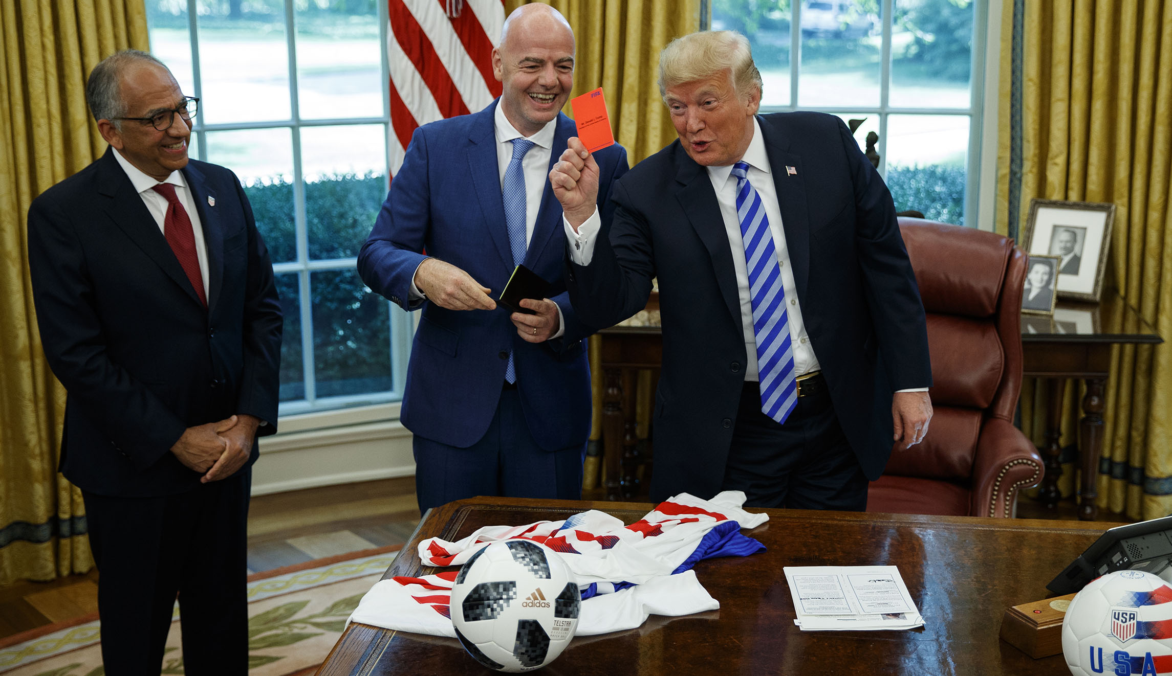 Trump jokingly gives media a soccer red penalty card