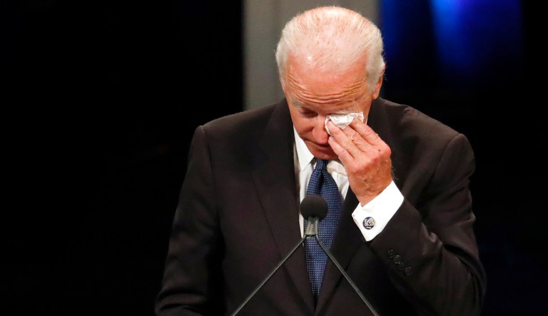 Former Vice President Joe Biden wipes a tear while giving a tribute during memorial service at North Phoenix Baptist Church for Sen. John McCain, R-Ariz., on Thursday in Phoenix.