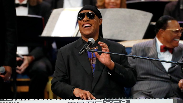 Stevie Wonder performs during the funeral service for Aretha Franklin at Greater Grace Temple.