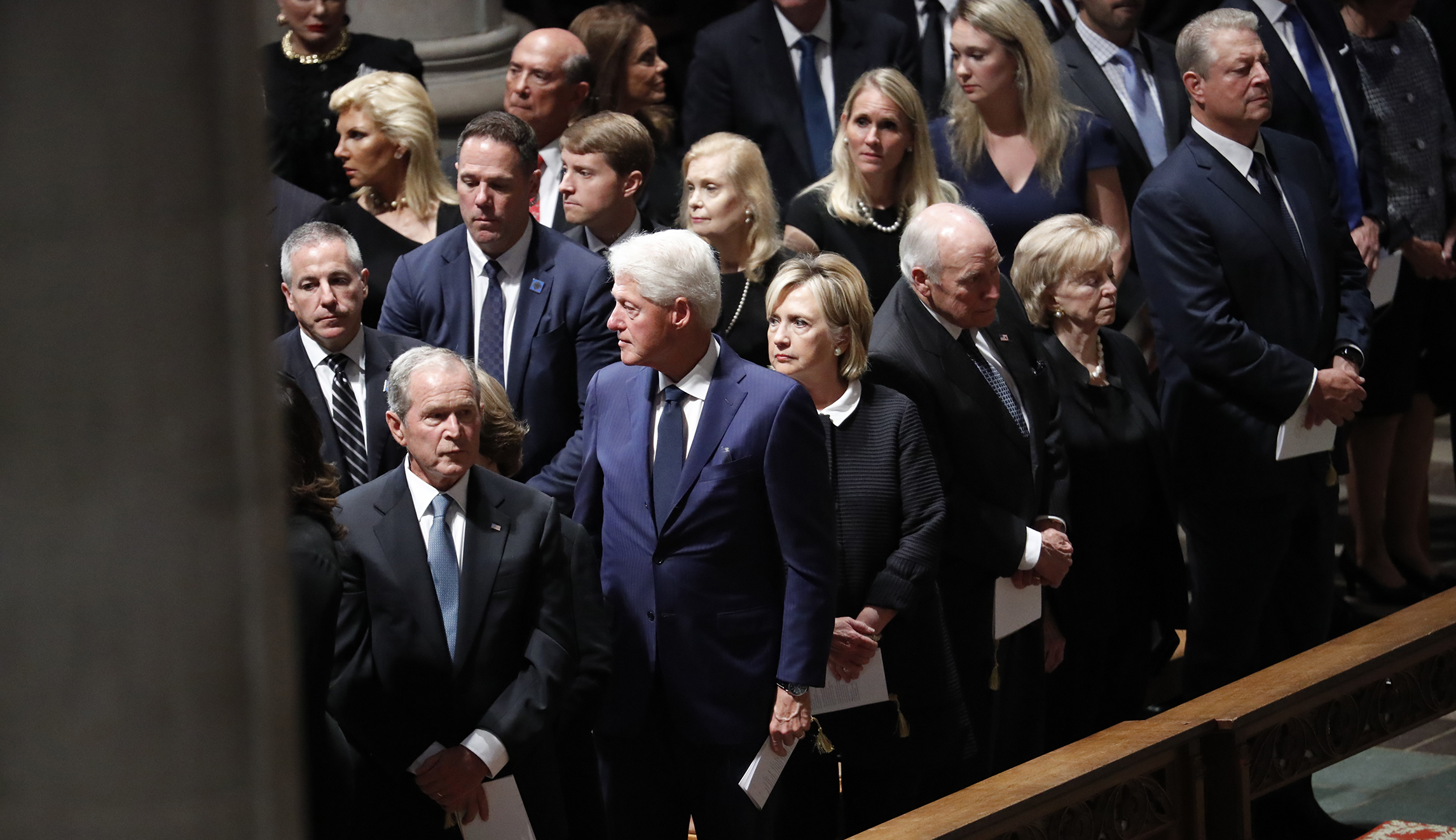 Former President George W. Bush, former President Bill Clinton and his wife former Secretary of State Hillary Clinton, former Vice President Dick Cheney and his wife Lynne and former Vice President Al Gore arrive for a memorial service for Sen. John McCain, R-Ariz., at Washington National Cathedral in Washington, Saturday.