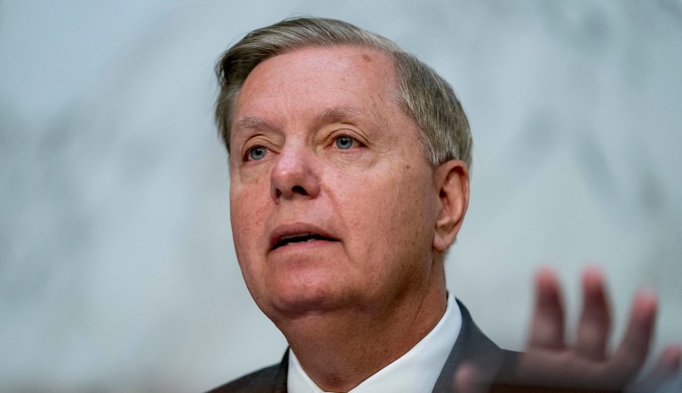 Sen. Lindsey Graham, R-S.C., questions President Trump's Supreme Court nominee, Brett Kavanaugh, as he testifies before the Senate Judiciary Committee on Capitol Hill in Washington on Wednesday for the second day of his confirmation hearing to replace retired Justice Anthony Kennedy.