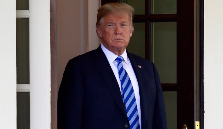 President Donald Trump waits to greet the Emir of Kuwait Sheikh Sabah Al Ahmad Al Sabah at the West Wing of the White House in Washington, Wednesday, Sept. 5, 2018.