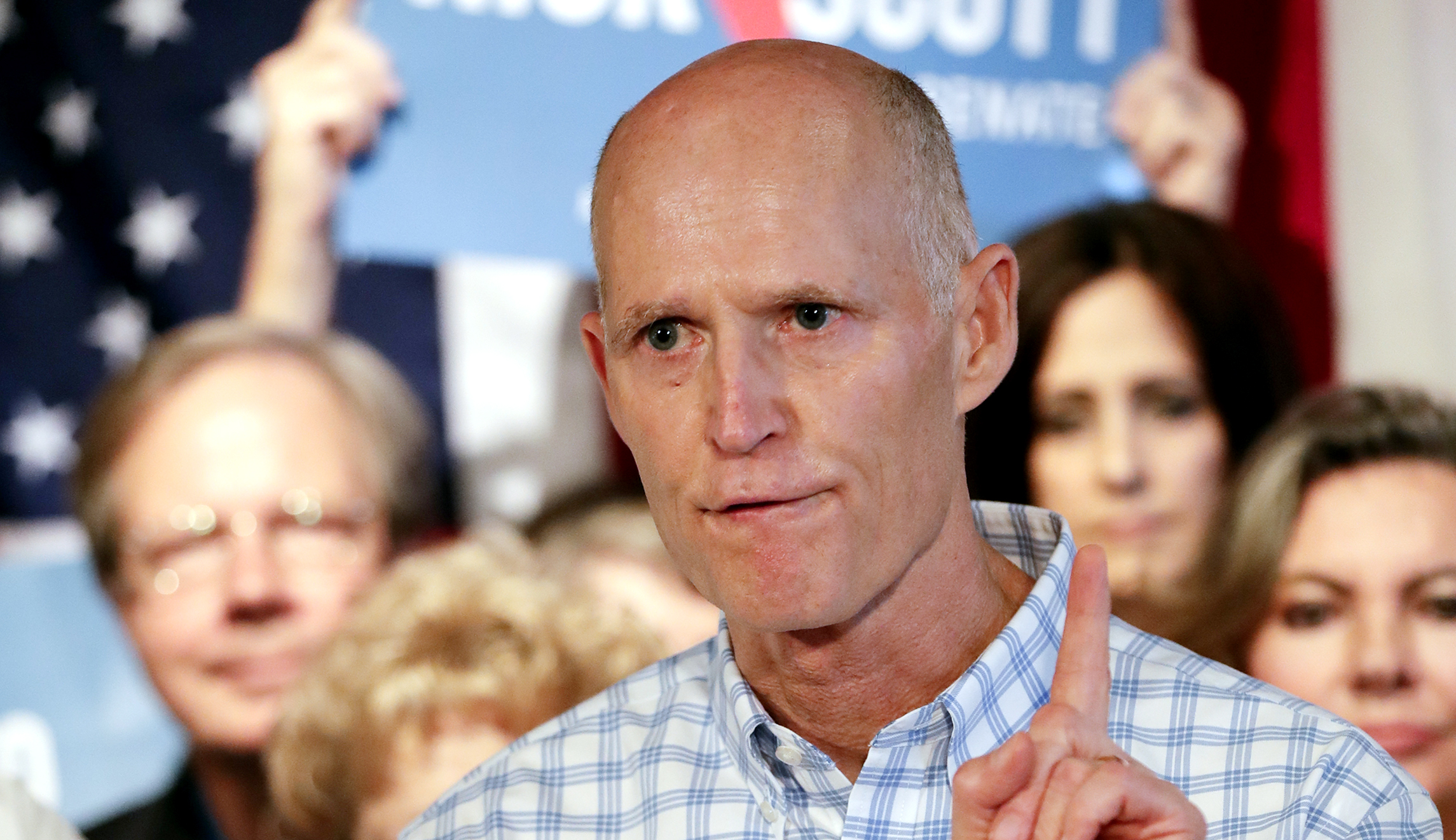 Gov. Rick Scott, still in contention for Senate, sues Florida county holding up election results