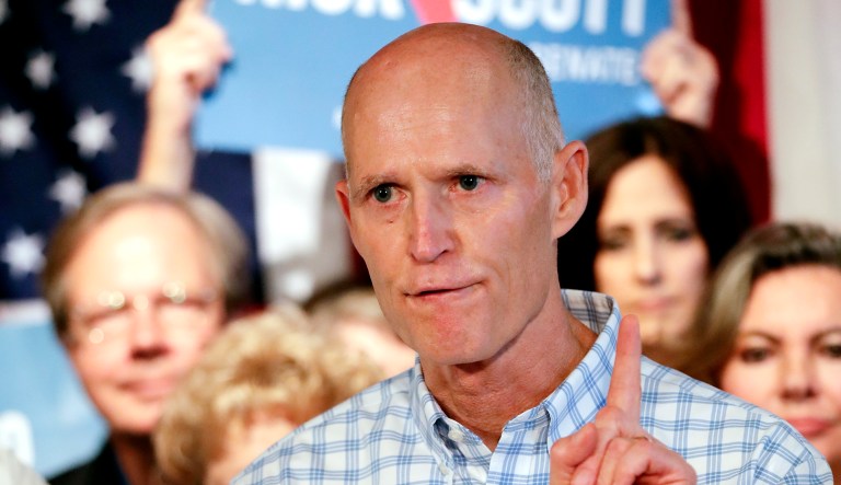 Florida Gov. Rick Scott speaks to supporters at a Republican rally in Orlando.