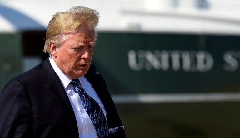 President Trump walks up the steps of Air Force One at Andrews Air Force Base in Maryland, Sept. 6, 2018.