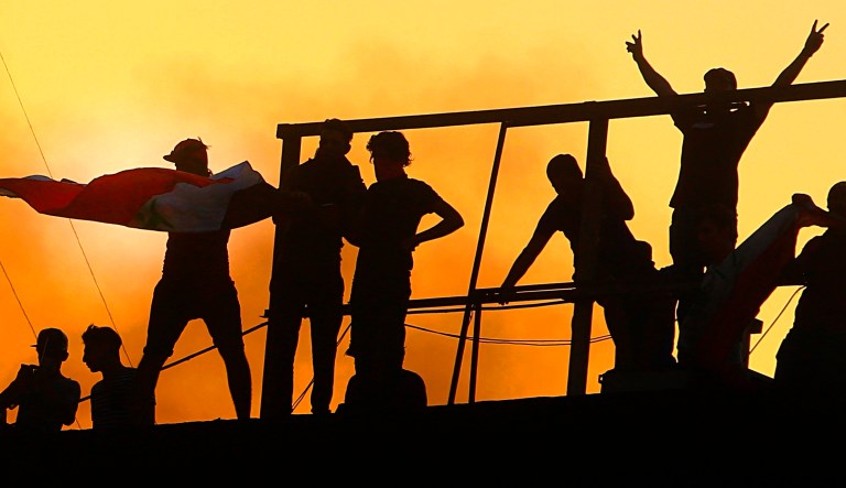 Protesters storm and burn a Basra government building during a demonstration demanding better public services and jobs in Basra, 340 miles southeast of Baghdad, Iraq, Sept. 7, 2018.