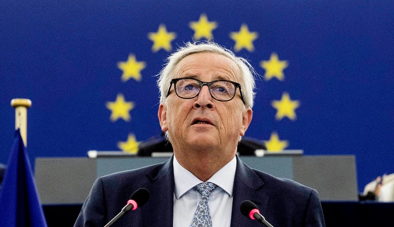 European Commission President Jean-Claude Juncker, center, delivers a speech at the European Parliament.