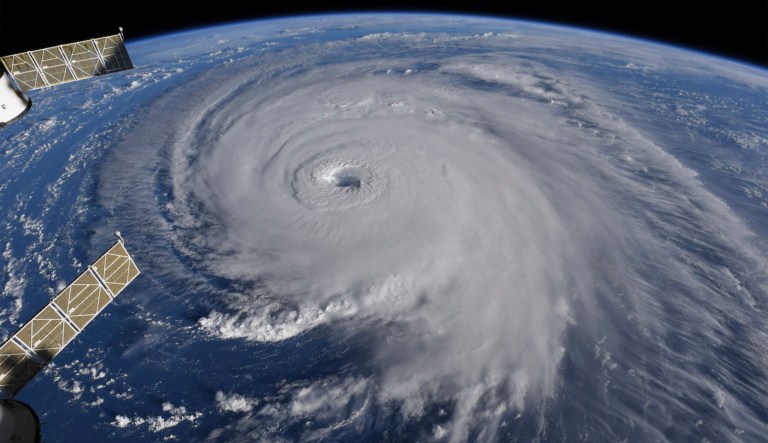This image provided by NASA shows Hurricane Florence from the International Space Station on Wednesday, Sept. 12, 2018, as it threatens the U.S. East Coast. Hurricane Florence is coming closer and getting stronger on a path to squat over North and South Carolina for days, surging over the coast, dumping feet of water deep inland and causing floods from the sea to the Appalachian Mountains and back again. 