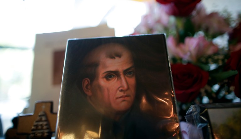 A portrait of Franciscan missionary Junipero Serra can be seen in the gift shop of the Mission San Diego de Acala in San Diego on Jan. 27, 2015.