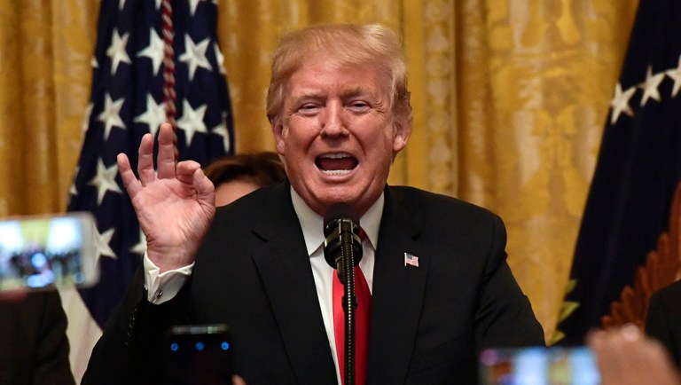 President Trump speaks during a Hispanic Heritage Month Celebration in the East Room of the White House.