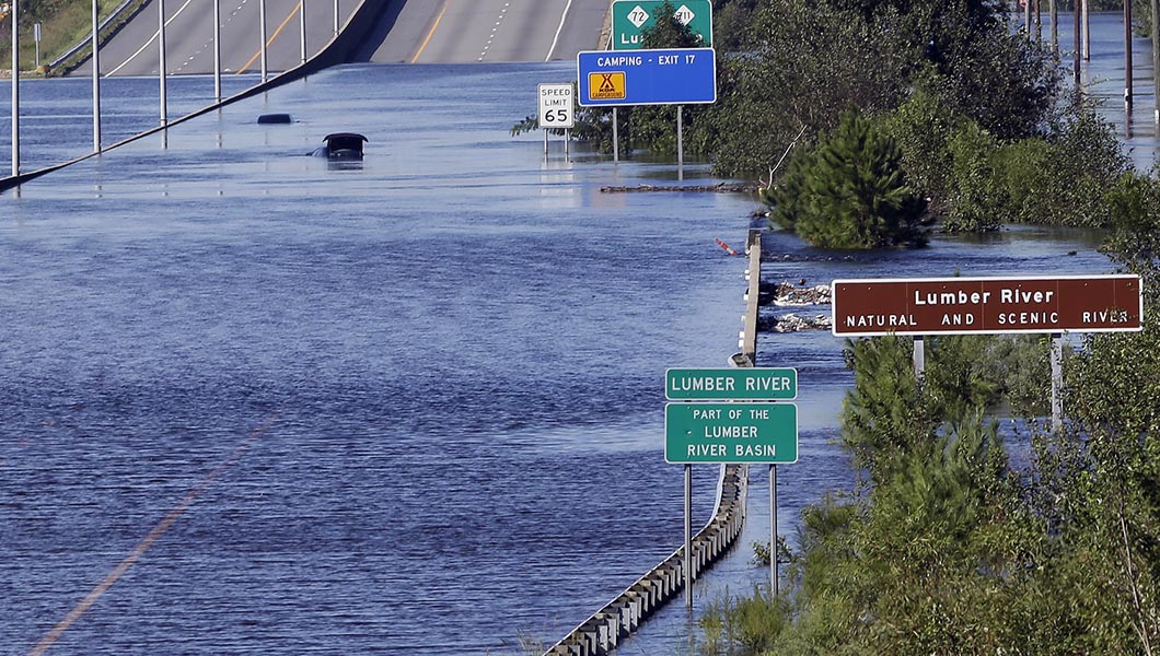 The Lumber River overflows onto a stretch Interstate 95 in Lumberton, N.C. following flooding from Hurricane Florence.