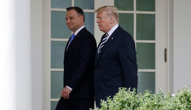 President Donald Trump walks with Polish President Andrzej Duda at the White House, Tuesday, Sept. 18, 2018, in Washington. 