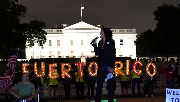 Jennice Fuentes, center, of Power 4 Puerto Rico, speaks outside the White House.